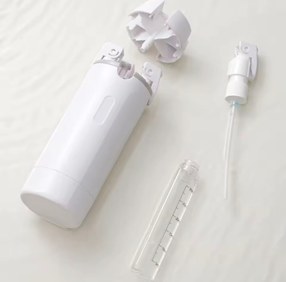 Dispensador 4 en 1 para viajes